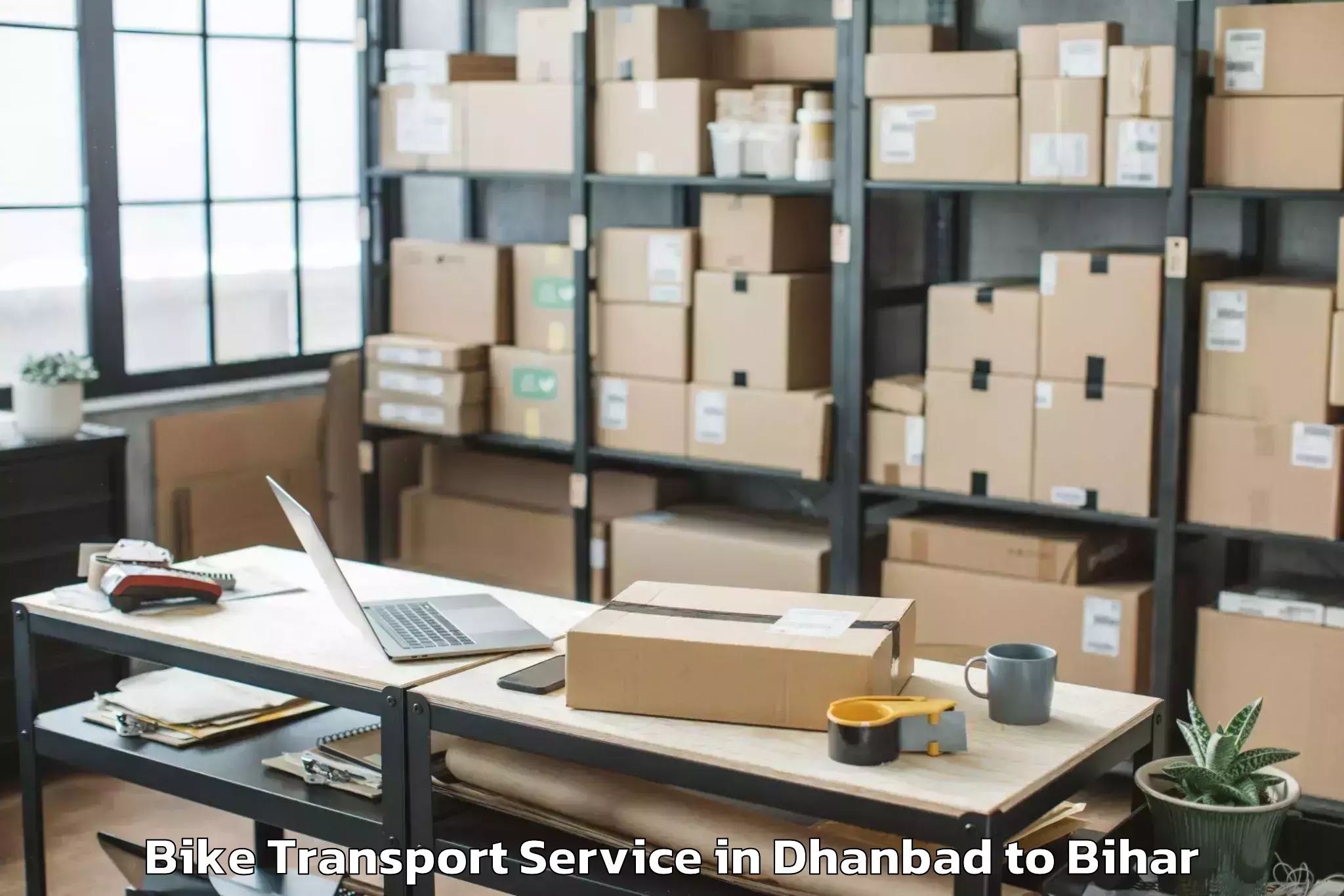 Book Dhanbad to Madhipura Bike Transport Online